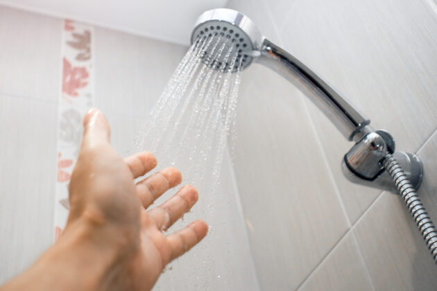 Why Your Hot Water Temperature Fluctuates When Multiple Fixtures Run at Once