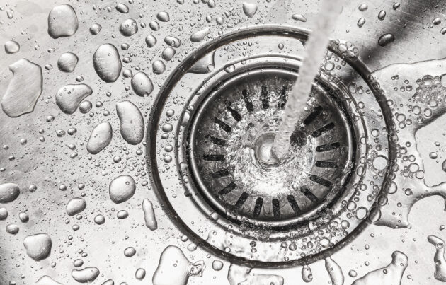 Why Drain Cleaning Sometimes Improves Water Pressure Throughout the Home